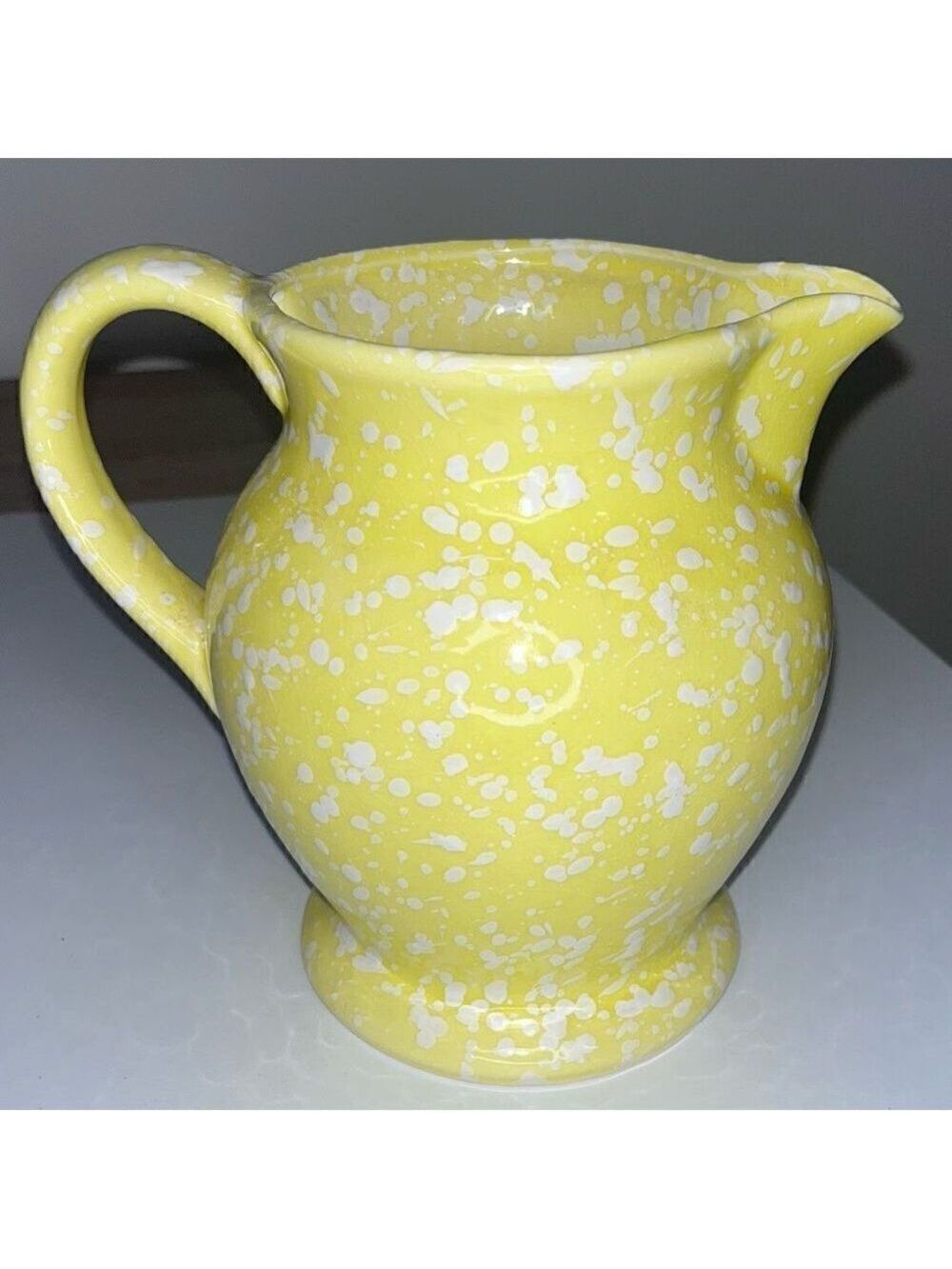Yellow/white polka dot pitcher Jamestown country ware 7" handle